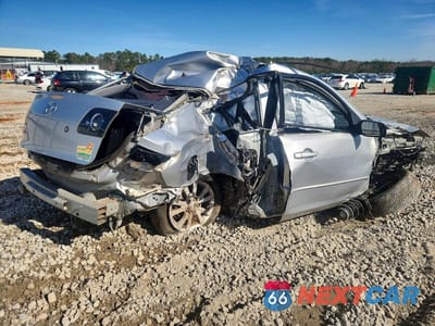 Trzecie zdjęcie samochodu z tyłu: 2007 MAZDA 3 I VIN:JM1BK32F571664014 - miniatura