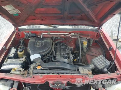 Zdjęcie 12 z 13 samochodu: 2002 NISSAN FRONTIER KING CAB XE VIN:1N6DD26S52C320083 - miniatura