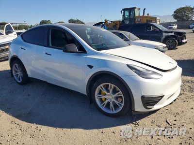 Czwarte zdjęcie samochodu z boku: 2023 TESLA MODEL Y VIN:7SAYGDEE1PA151600 - miniatura