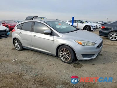 Czwarte zdjęcie samochodu z boku: 2015 FORD FOCUS SE VIN:1FADP3K28FL244893 - miniatura