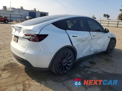 Trzecie zdjęcie samochodu z tyłu: 2022 TESLA MODEL Y VIN:7SAYGDEFXNF568576 - miniatura