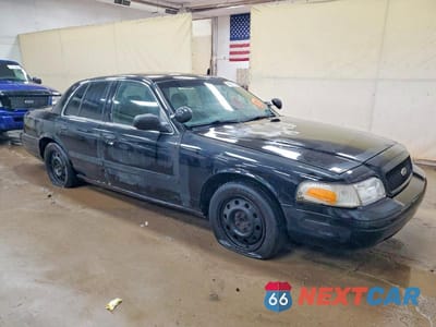 Czwarte zdjęcie samochodu z boku: 2006 FORD CROWN VICTORIA POLICE INTERCEPTOR VIN:2FAFP71W46X135287 - miniatura