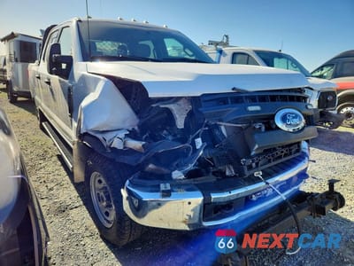 Czwarte zdjęcie samochodu z boku: 2022 FORD F350 VIN:1FT7W3B64NEF59741 - miniatura