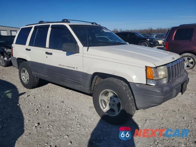 Czwarte zdjęcie samochodu z boku: 1996 JEEP GRAND CHEROKEE LAREDO VIN:1J4EZ58S6TC134832 - miniatura