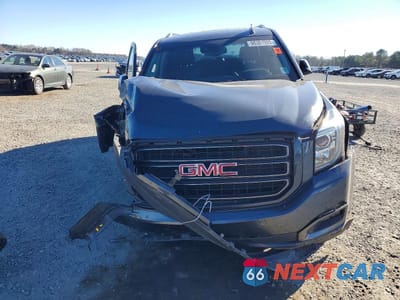 Piąte zdjęcie samochodu w środku: 2019 GMC YUKON SLT VIN:1GKS2BKJ7KR169200 - miniatura