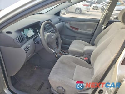 Zdjęcie 7 z 12 samochodu: 2004 TOYOTA COROLLA CE VIN:JTDBR32E342042858 - miniatura
