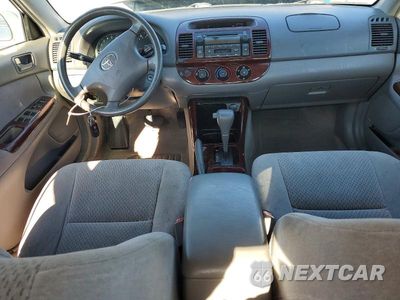 Zdjęcie 8 z 12 samochodu: 2004 TOYOTA CAMRY LE VIN:4T1BE32K44U299447 - miniatura