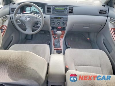 Zdjęcie 8 z 12 samochodu: 2004 TOYOTA COROLLA CE VIN:JTDBR32E342042858 - miniatura