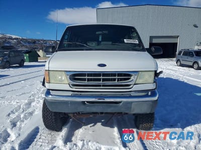 Piąte zdjęcie samochodu w środku: 2002 FORD ECONOLINE E350 SUPER DUTY WAGON VIN:1FMNE31F02HB58625 - miniatura