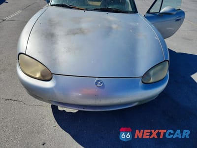 Zdjęcie 11 z 12 samochodu: 1999 MAZDA MX-5 MIATA VIN:JM1NB3530X0118676 - miniatura