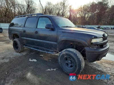 Czwarte zdjęcie samochodu z boku: 2002 CHEVROLET SUBURBAN K1500 VIN:3GNFK16Z32G187210 - miniatura