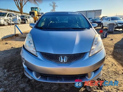 Piąte zdjęcie samochodu w środku: 2009 HONDA FIT SPORT VIN:JHMGE88419S054798 - miniatura