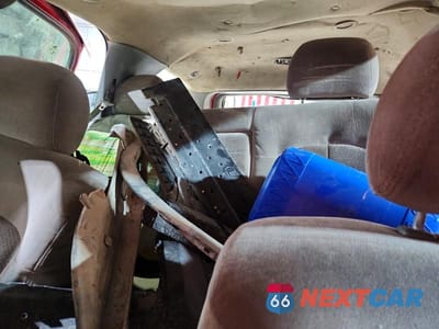 Zdjęcie 10 z 12 samochodu: 2002 CHEVROLET TAHOE C1500 VIN:1GNEC13V32R118219 - miniatura