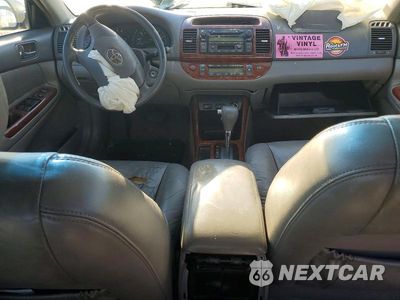 Zdjęcie 8 z 11 samochodu: 2004 TOYOTA CAMRY LE VIN:4T1BE30K34U902603 - miniatura