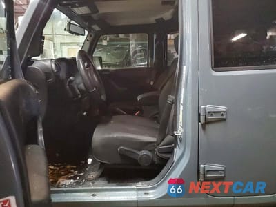 Zdjęcie 7 z 12 samochodu: 2015 JEEP WRANGLER UNLIMITED SPORT VIN:1C4HJWDG0FL656264 - miniatura
