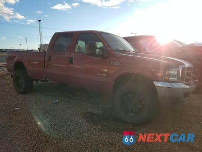 Czwarte zdjęcie samochodu z boku: 2003 FORD F350 SRW SUPER DUTY VIN:1FTSW31P83EC59167 - miniatura