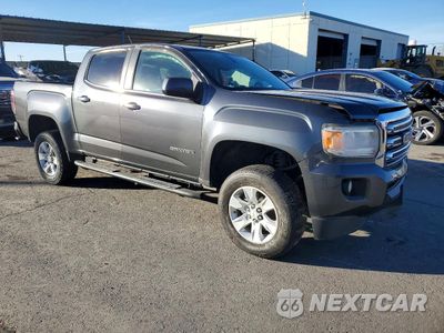 Czwarte zdjęcie samochodu z boku: 2016 GMC CANYON SLE VIN:1GTG5CE33G1201982 - miniatura