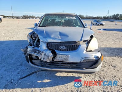 Piąte zdjęcie samochodu w środku: 2006 KIA RIO BASE VIN:KNADE123766157124 - miniatura