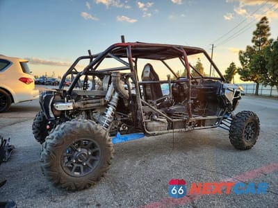 Czwarte zdjęcie samochodu z boku: 2022 POLARIS RZR 1000 UTILITY VEHICLE VIN:3NSN4K997NH667537 - miniatura
