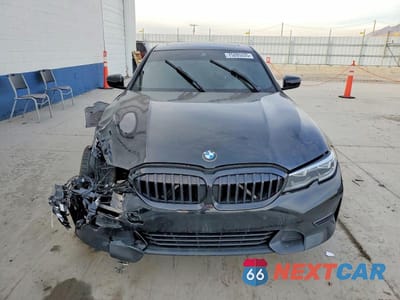 Piąte zdjęcie samochodu w środku: 2021 BMW 330XI VIN:3MW5R7J00M8B64327 - miniatura