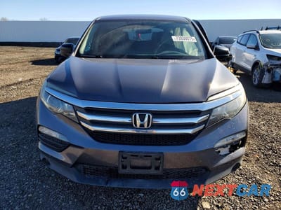 Piąte zdjęcie samochodu w środku: 2018 HONDA PILOT LX VIN:5FNYF5H15JB014782 - miniatura