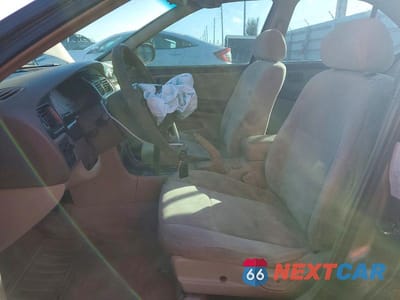 Zdjęcie 7 z 12 samochodu: 1999 NISSAN ALTIMA XE VIN:1N4DL01D9XC126561 - miniatura