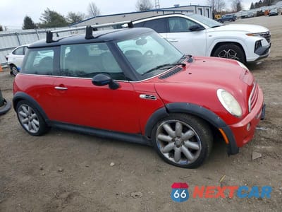 Czwarte zdjęcie samochodu z boku: 2003 MINI COOPER S VIN:WMWRE33423TD65811 - miniatura