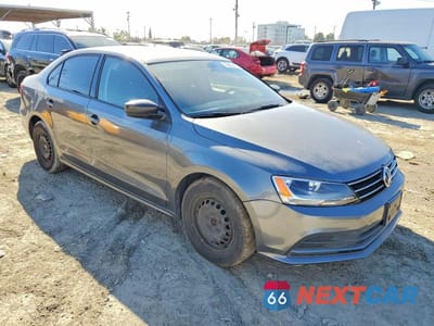 Czwarte zdjęcie samochodu z boku: 2016 VOLKSWAGEN JETTA S VIN:3VW267AJ5GM299156 - miniatura
