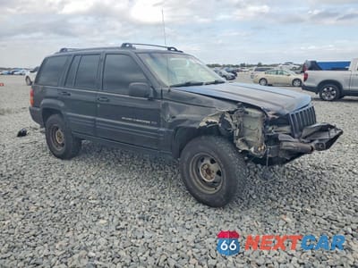 Czwarte zdjęcie samochodu z boku: 1998 JEEP GRAND CHEROKEE LAREDO VIN:1J4FX48S5WC336733 - miniatura