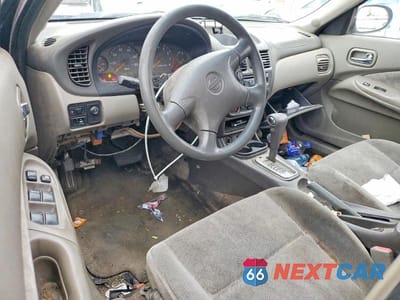 Zdjęcie 8 z 11 samochodu: 2002 NISSAN SENTRA XE VIN:3N1CB51D72L685113 - miniatura