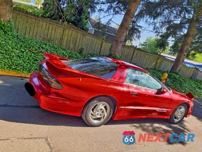 Czwarte zdjęcie samochodu z boku: 1993 PONTIAC FIREBIRD FORMULA VIN:2G2FV22P4P2206209 - miniatura