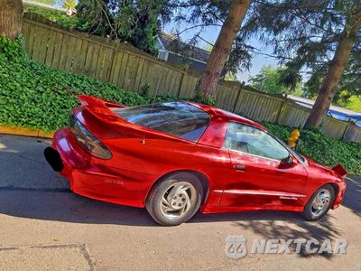 Czwarte zdjęcie samochodu z boku: 1993 PONTIAC FIREBIRD FORMULA VIN:2G2FV22P4P2206209 - miniatura
