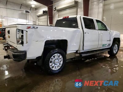 Trzecie zdjęcie samochodu z tyłu: 2017 CHEVROLET SILVERADO K2500 HEAVY DUTY LT VIN:1GC1KVEY6HF149225 - miniatura