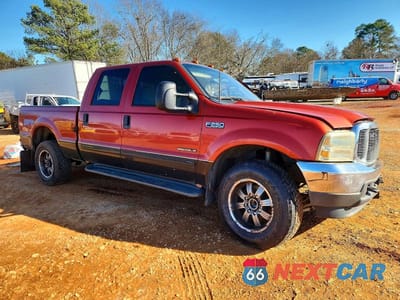 Czwarte zdjęcie samochodu z boku: 2001 FORD F250 SUPER DUTY VIN:1FTNW21F21EB20759 - miniatura