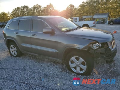 Czwarte zdjęcie samochodu z boku: 2012 JEEP GRAND CHEROKEE LAREDO VIN:1C4RJFAG2CC150584 - miniatura