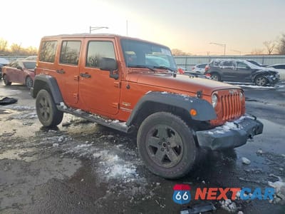 Czwarte zdjęcie samochodu z boku: 2011 JEEP WRANGLER UNLIMITED SAHARA VIN:1J4HA5H1XBL572649 - miniatura