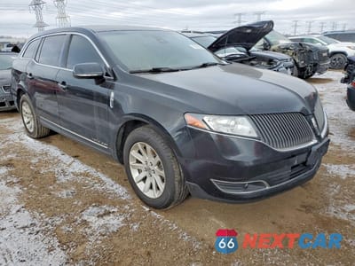 Czwarte zdjęcie samochodu z boku: 2015 LINCOLN MKT VIN:2LMHJ5NK8FBL00125 - miniatura