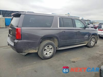 Trzecie zdjęcie samochodu z tyłu: 2016 CHEVROLET SUBURBAN K1500 LTZ VIN:1GNSKJKC6GR101203 - miniatura