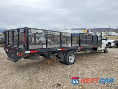 Trzecie zdjęcie samochodu z tyłu: 2022 RAM 3500 FLATBED TRUCK VIN:3C7WRTBL5NG421162 - miniatura