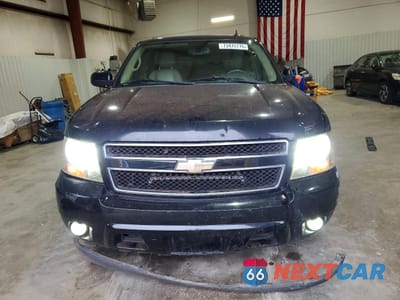 Piąte zdjęcie samochodu w środku: 2011 CHEVROLET SUBURBAN C1500 LT VIN:1GNSCJE05BR181780 - miniatura