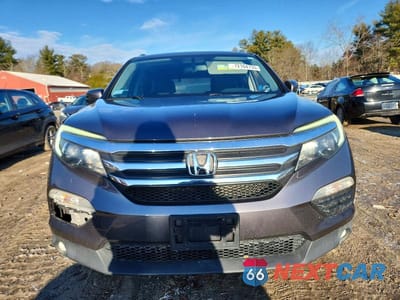 Piąte zdjęcie samochodu w środku: 2017 HONDA PILOT EXL VIN:5FNYF6H59HB088631 - miniatura