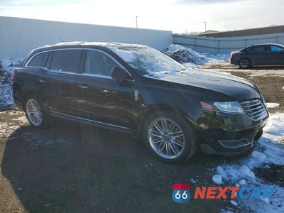 Czwarte zdjęcie samochodu z boku: 2019 LINCOLN MKT VIN:2LMHJ5AT1KBL01593 - miniatura