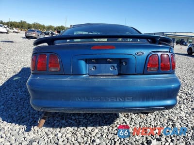 Zdjęcie 6 z 11 samochodu: 1998 FORD MUSTANG VIN:1FAFP4045WF219628 - miniatura