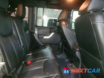 Zdjęcie 10 z 11 samochodu: 2014 JEEP WRANGLER UNLIMITED SAHARA VIN:1C4HJWEG0EL174181 - miniatura