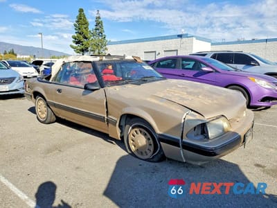 Czwarte zdjęcie samochodu z boku: 1987 FORD MUSTANG LX VIN:1FABP44A0HF226360 - miniatura