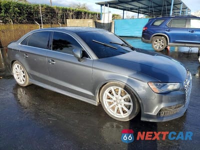 Czwarte zdjęcie samochodu z boku: 2015 AUDI S3 PRESTIGE VIN:WAUFFGFF6F1074231 - miniatura