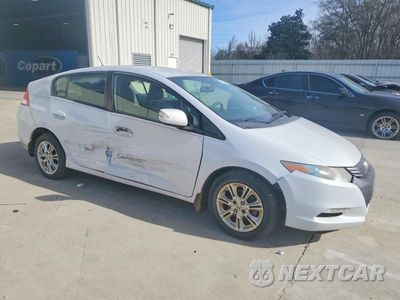 Czwarte zdjęcie samochodu z boku: 2010 HONDA INSIGHT EX VIN:JHMZE2H7XAS018404 - miniatura