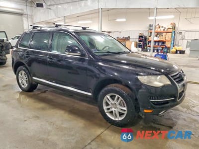 Czwarte zdjęcie samochodu z boku: 2008 VOLKSWAGEN TOUAREG 2 V6 VIN:WVGLE77L68D054894 - miniatura