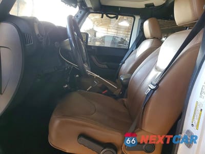 Zdjęcie 7 z 11 samochodu: 2013 JEEP WRANGLER UNLIMITED SAHARA VIN:1C4BJWEG5DL613413 - miniatura