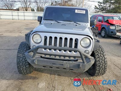 Piąte zdjęcie samochodu w środku: 2014 JEEP WRANGLER UNLIMITED SAHARA VIN:1C4BJWEGXEL186926 - miniatura